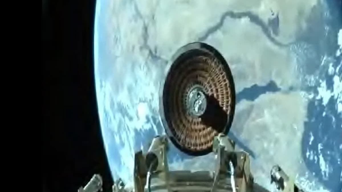 a round object in space in front of earth below