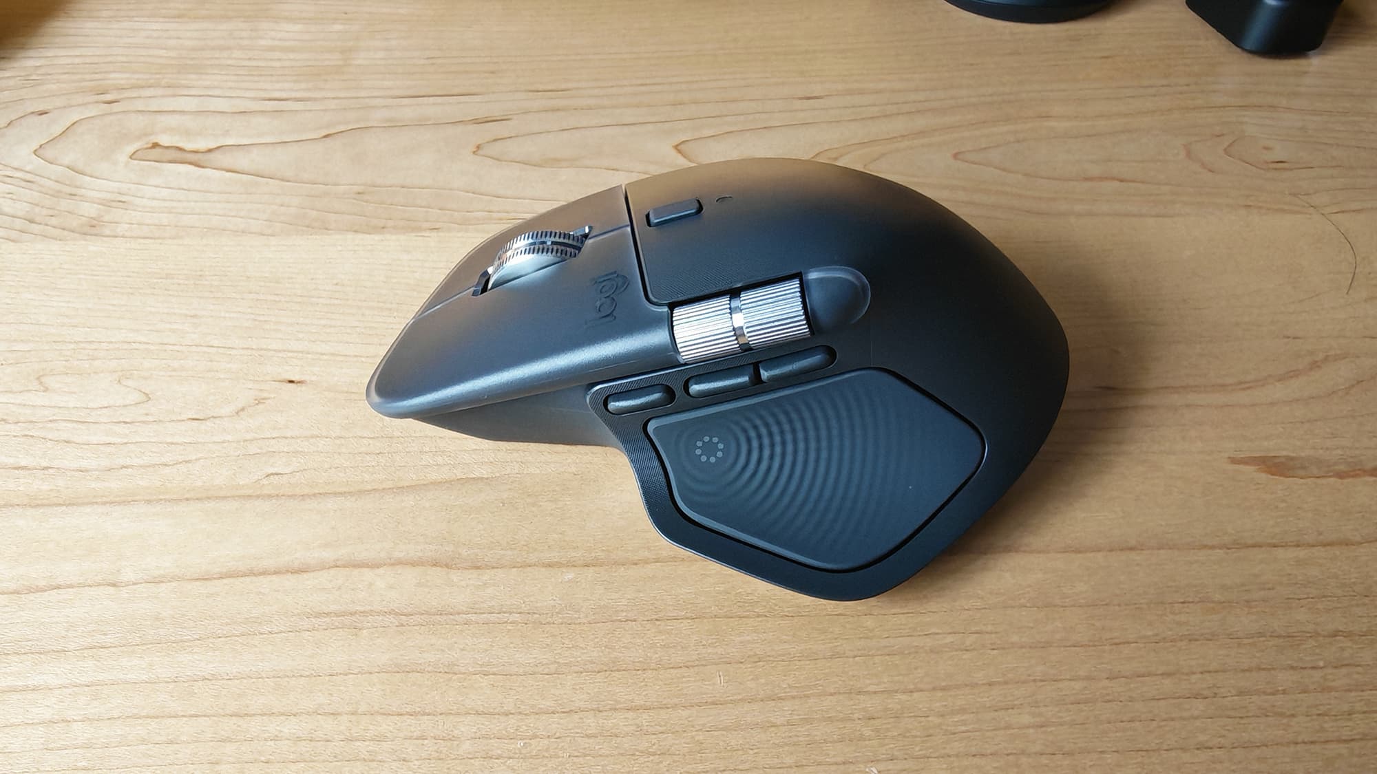 The Logitech MX Master 4 mouse, from different angles.