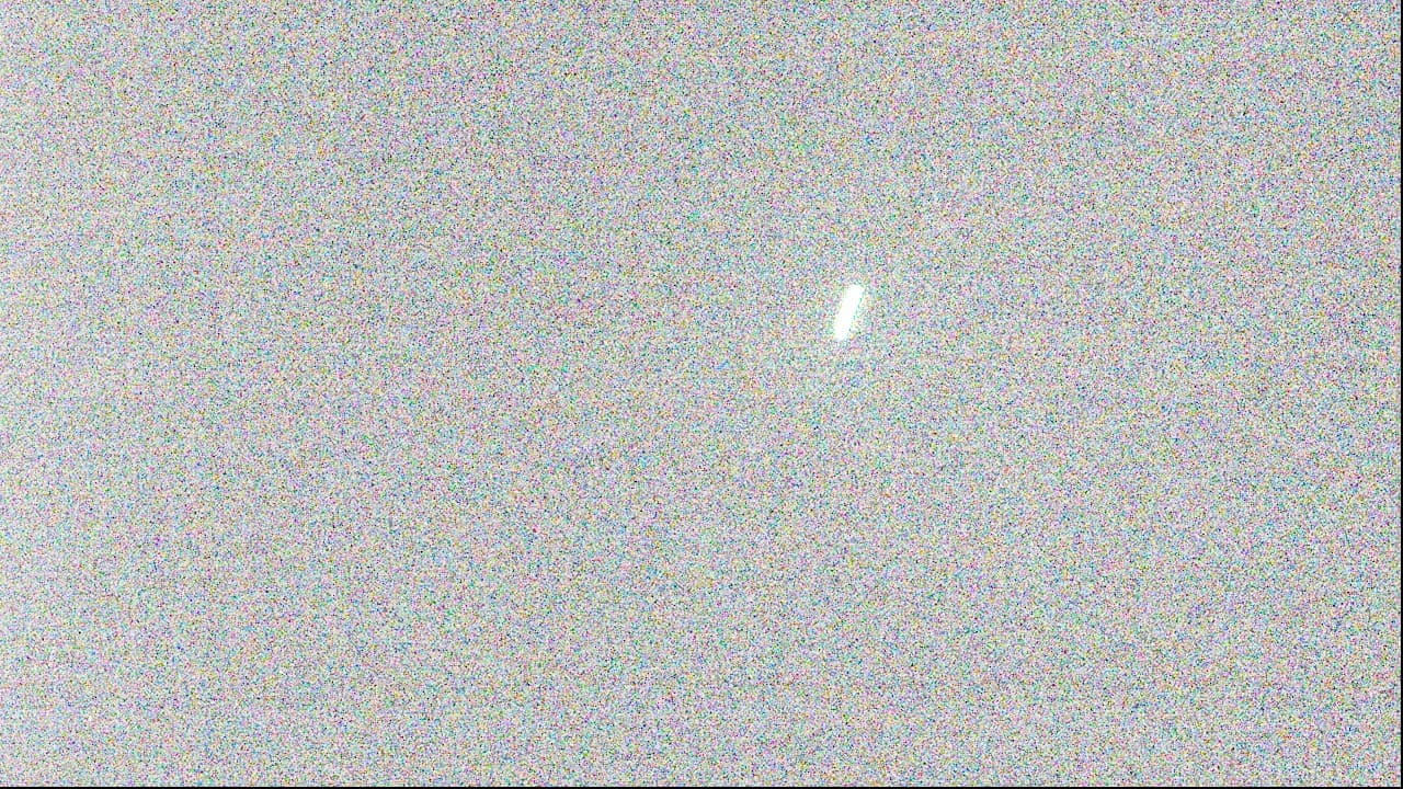 a streak of light on a black background