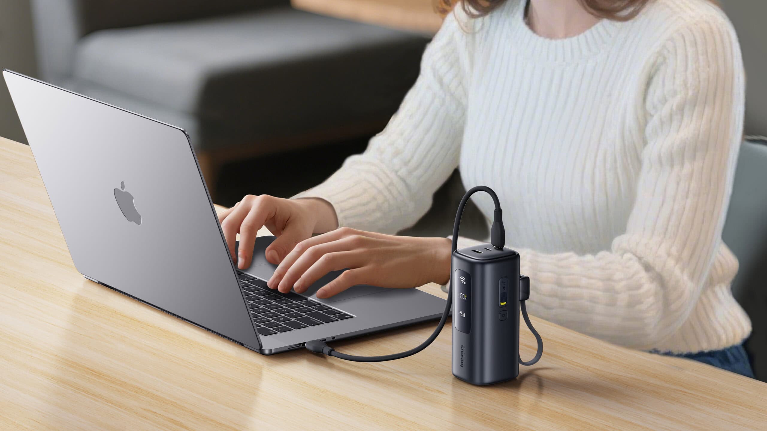 Woman using Baseus EnerGeek GX11 in desk