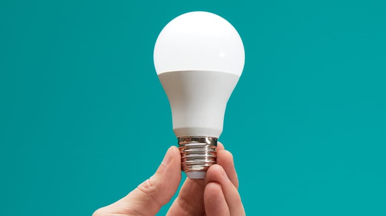 Person changing lightbulbs